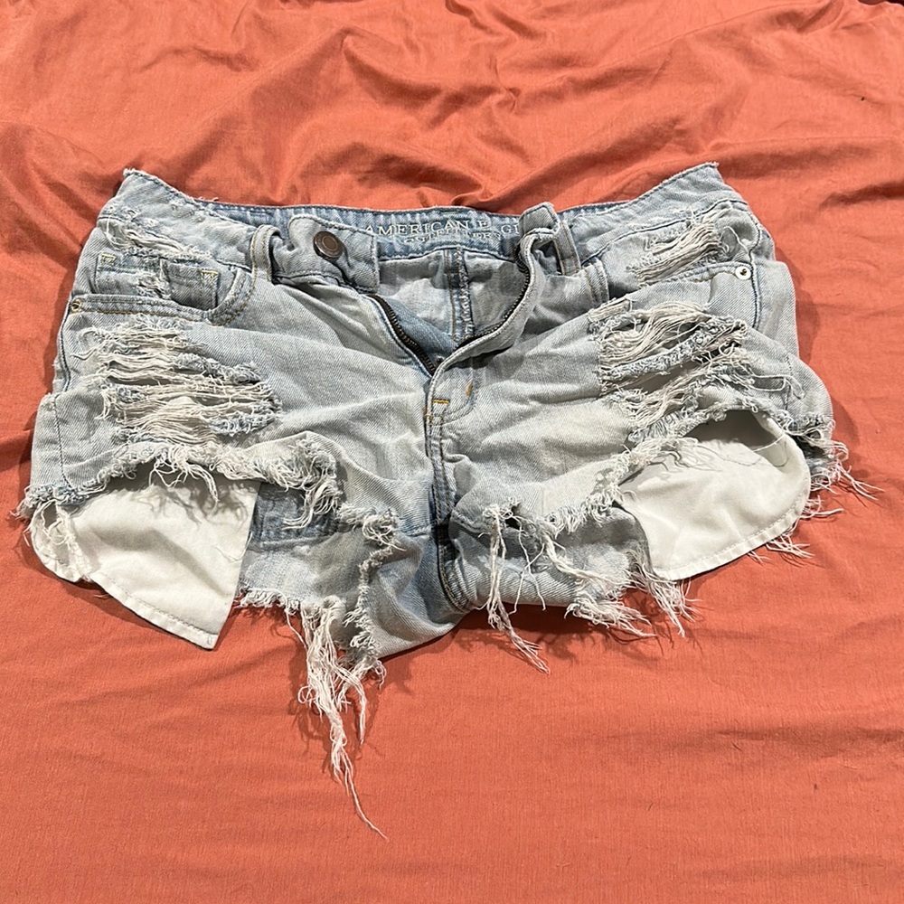 Light ripped denim shorts